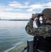Sailors Stand Watch As USS Nimitz Gets Underway