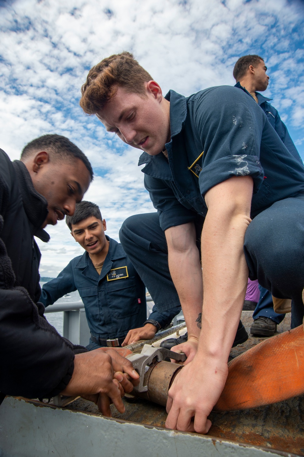 Sailors Disconnect Hose
