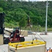 Sailors provide cargo handling and transportation services of ammo ISO containers aboard MV Ocean Glory