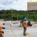Sailors provide cargo handling and transportation services of ammo ISO containers aboard MV Ocean Glory