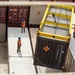 Sailors provide cargo handling and transportation services of ammo ISO containers aboard MV Ocean Glory