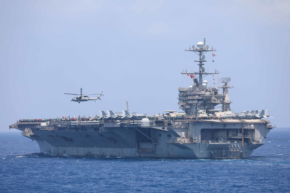 USS Cole Conducts a replenishment at sea with USNS Supply