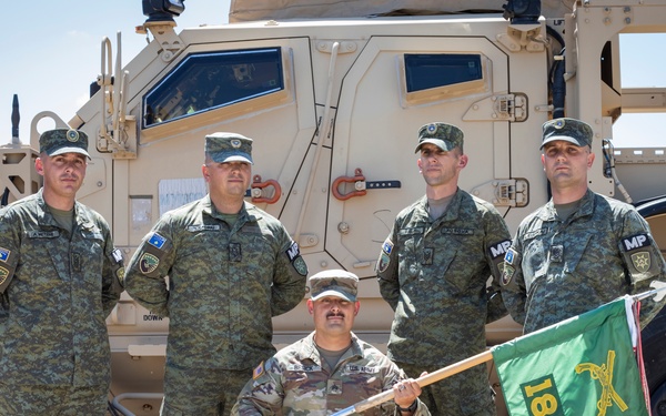 Kosovo Security Force and Iowa National Guard Military Police work together