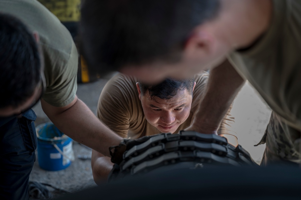 Crew chiefs change KC-135 brakes