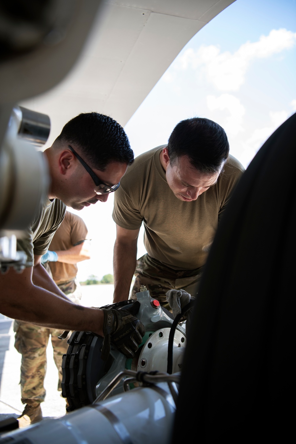 Crew chiefs change KC-135 brakes