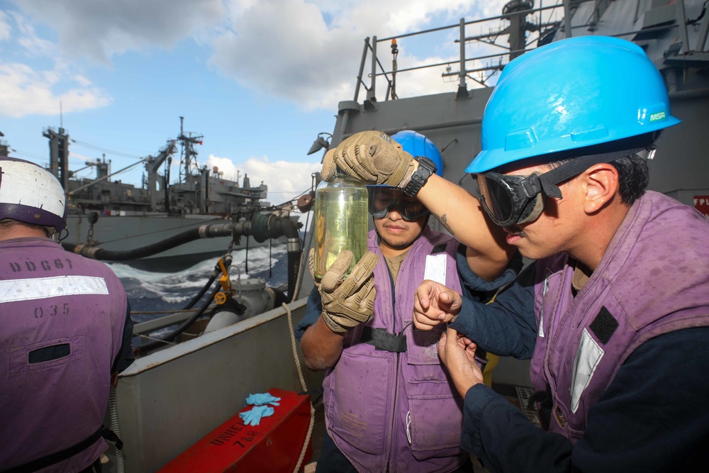 USS Cole Conducts a replenishment at sea with USNS Supply