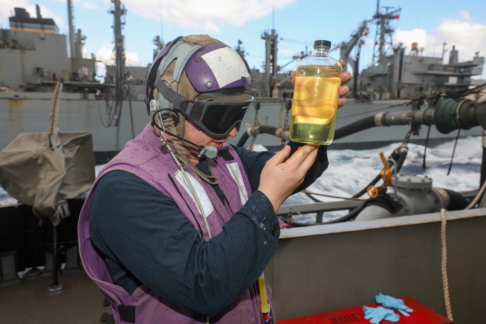 USS Cole Conducts a replenishment at sea with USNS Supply