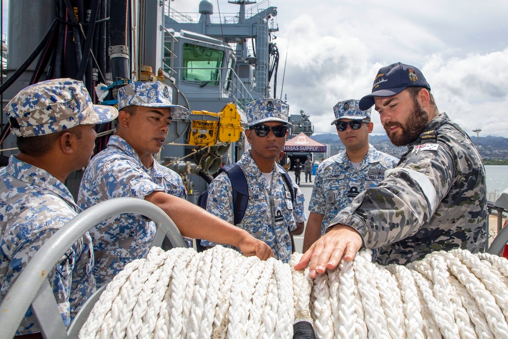 Multi-national partners tour HMAS Supply