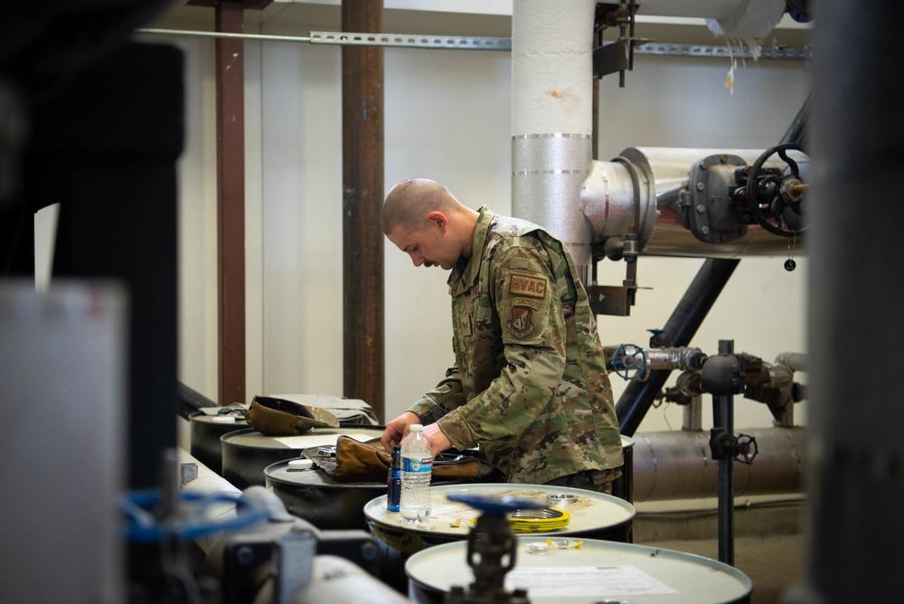 354th CES HVAC Airmen maintain cooling and heating systems