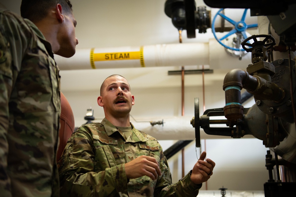354th CES HVAC Airmen maintain cooling and heating systems