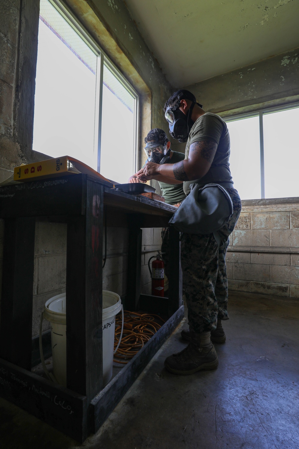 Marines with Combat Logistics Regiment 3 conduct CBRN response training