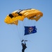 Soldier flies Michigan flag under parachute for demonstration at Selfridge Air National Guard Base