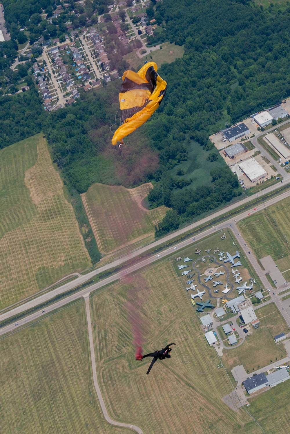 Soldier performs parachute cutaway maneuver at Selfridge Open House and Air Show