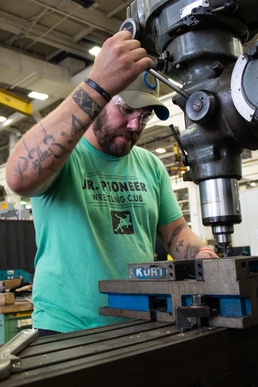 Personal challenges don’t deter graduation for RIA-JMTC machinist apprentice