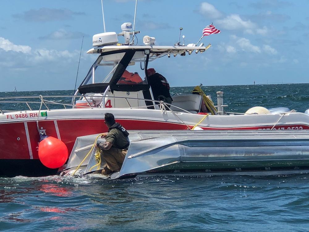 MacDill Airmen rescue 8 victims from a capsized vessel in Tampa Bay