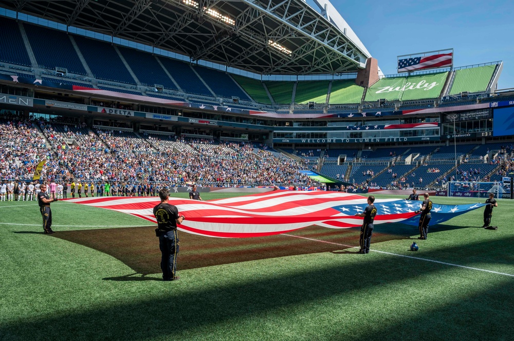 Leap Frogs Hold U.S. Flag