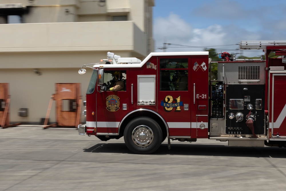 Firefighters and Engineers from Marine Corps Installation Pacific Fire and Emergency Services conduct HAZMAT training