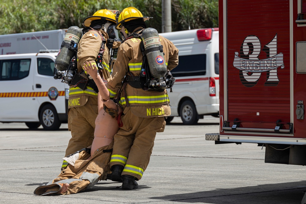 Firefighters and Engineers from Marine Corps Installation Pacific Fire and Emergency Services conduct HAZMAT training