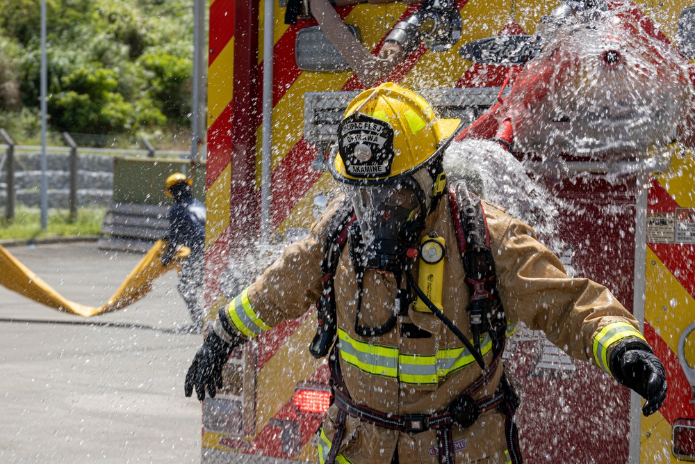 Firefighters and Engineers from Marine Corps Installation Pacific Fire and Emergency Services conduct HAZMAT training