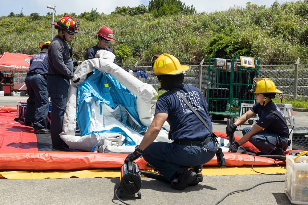 Firefighters and Engineers from Marine Corps Installation Pacific Fire and Emergency Services conduct HAZMAT training