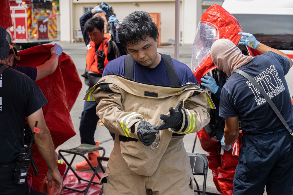 Firefighters and Engineers from Marine Corps Installation Pacific Fire and Emergency Services conduct HAZMAT training