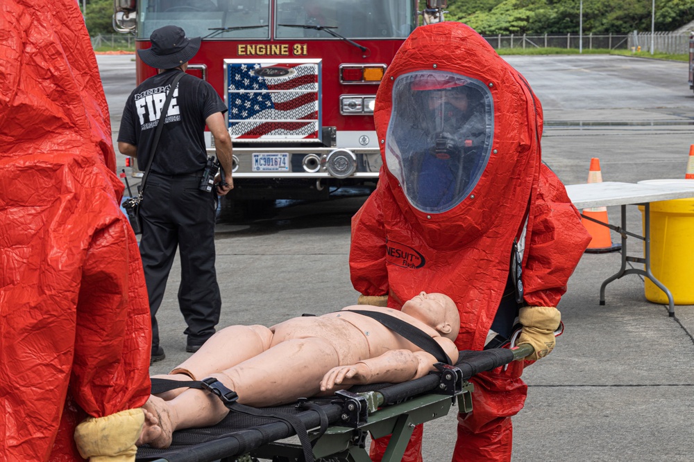 Firefighters and Engineers from Marine Corps Installation Pacific Fire and Emergency Services conduct HAZMAT training