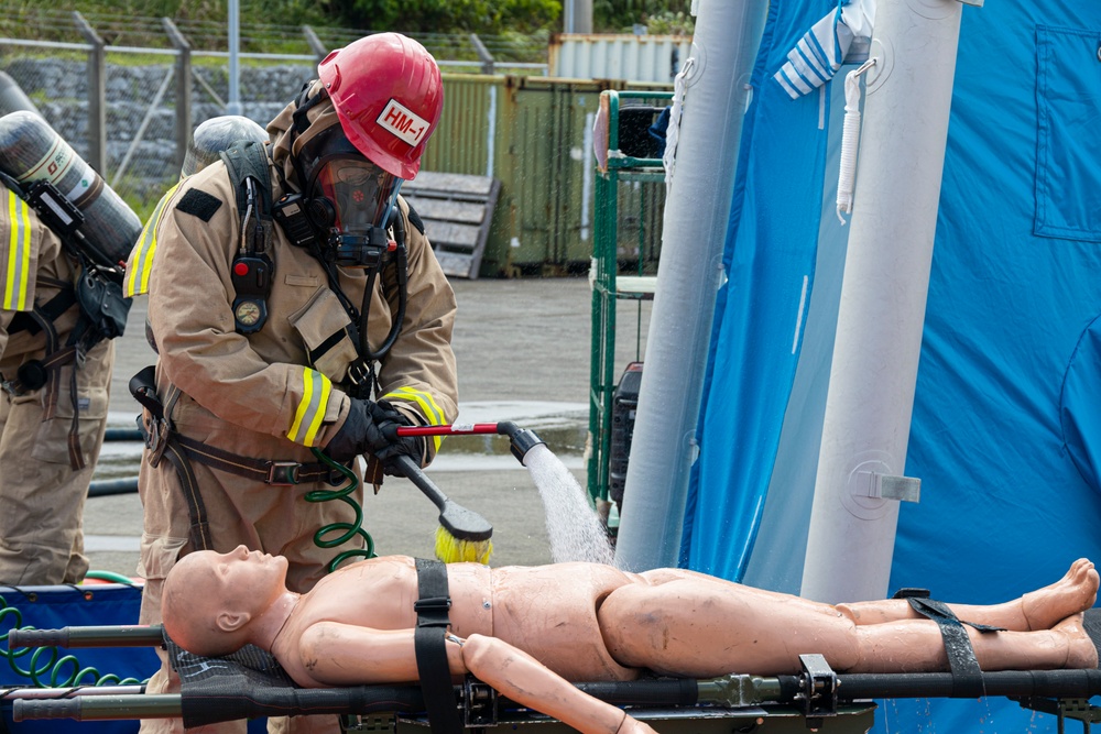 Firefighters and Engineers from Marine Corps Installation Pacific Fire and Emergency Services conduct HAZMAT training