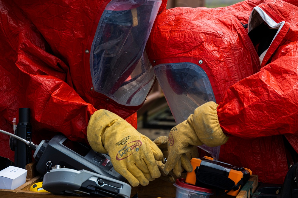 Firefighters and Engineers from Marine Corps Installation Pacific Fire and Emergency Services conduct HAZMAT training