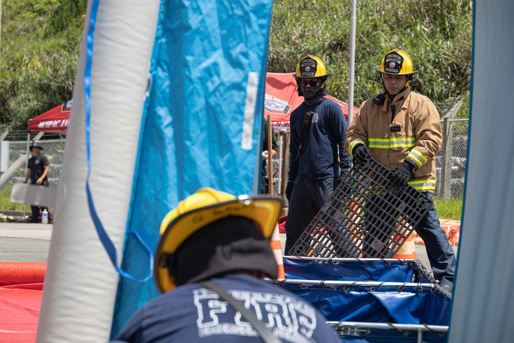 Firefighters and Engineers from Marine Corps Installation Pacific Fire and Emergency Services conduct HAZMAT training