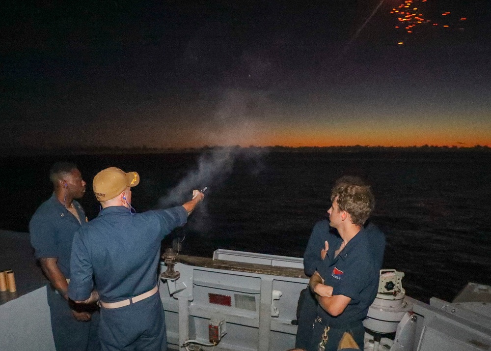 Cmdr. Seeger Fires Flare