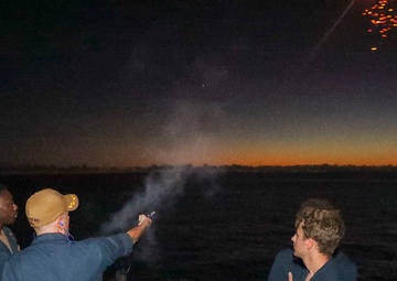 Cmdr. Seeger Fires Flare