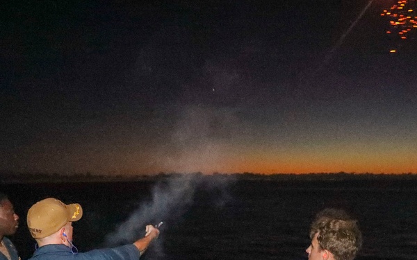 Cmdr. Seeger Fires Flare