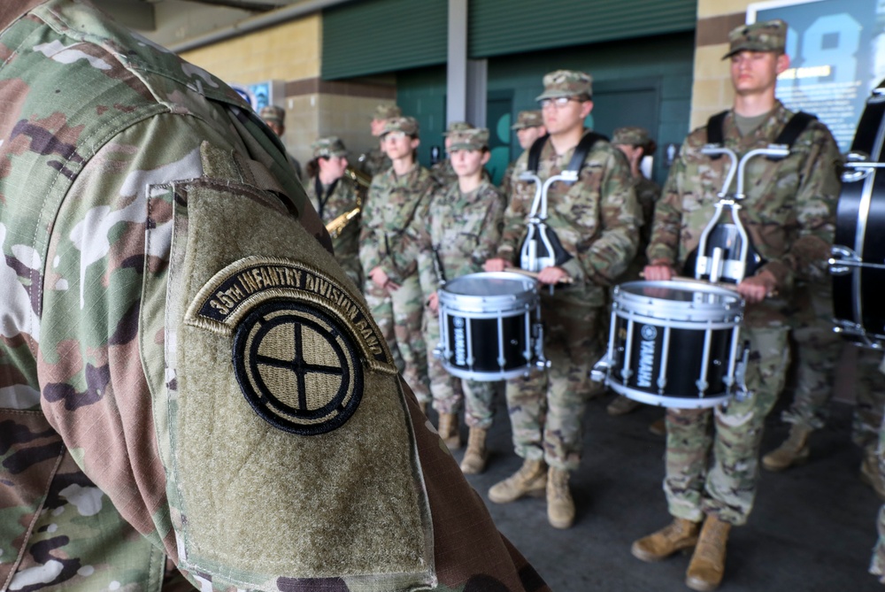 35th Infantry Division Band plays the national anthem at the Kansas City Monarchs baseball game