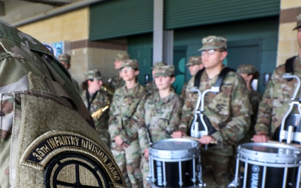 35th Infantry Division Band plays the national anthem at the Kansas City Monarchs baseball game
