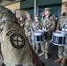 35th Infantry Division Band plays the national anthem at the Kansas City Monarchs baseball game