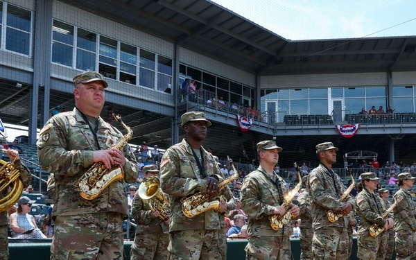 35th Infantry Division Band plays the national anthem at the Kansas City Monarchs baseball game