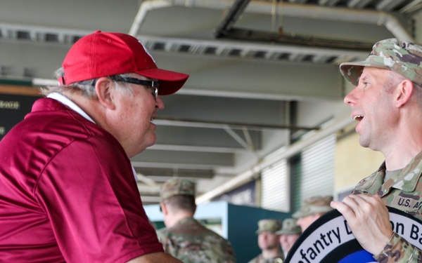 35th Infantry Division Band plays the national anthem at the Kansas City Monarchs baseball game
