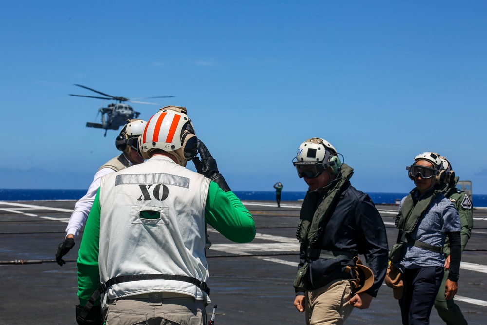 Abraham Lincoln welcomes leaders from the Republic of Korea, Peruvian Navy, and Royal Air Force during RIMPAC 2022