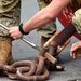 Divers from the U.S. Coast Guard, U.S. Army and the Republic of Korea Nay conduct training on repairing aids-to-navigation during RIMPAC 2022 prior to conducting joint dives