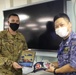 Gift exchange during cross deck walk for Rim of the Pacific (RIMPAC) 2022