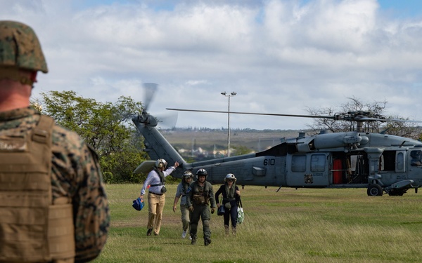 Distinguished Visitors and VIPs arrive at Ford Island HLZ during RIMPAC 2022