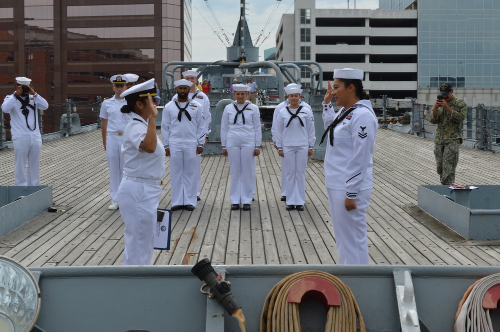 Naval Museum hosts a re-enlistment ceremony for USS Whidbey Island (LSD-41) Sailor
