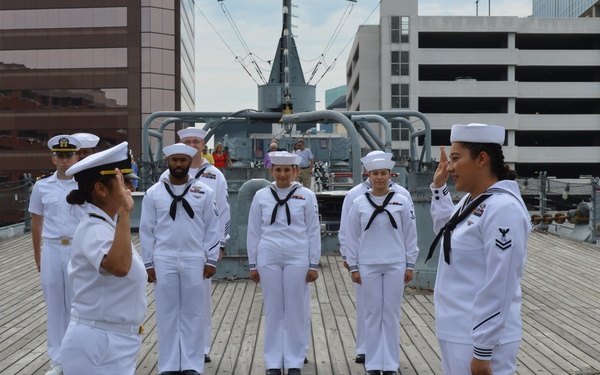 Naval Museum hosts a re-enlistment ceremony for USS Whidbey Island (LSD-41) Sailor