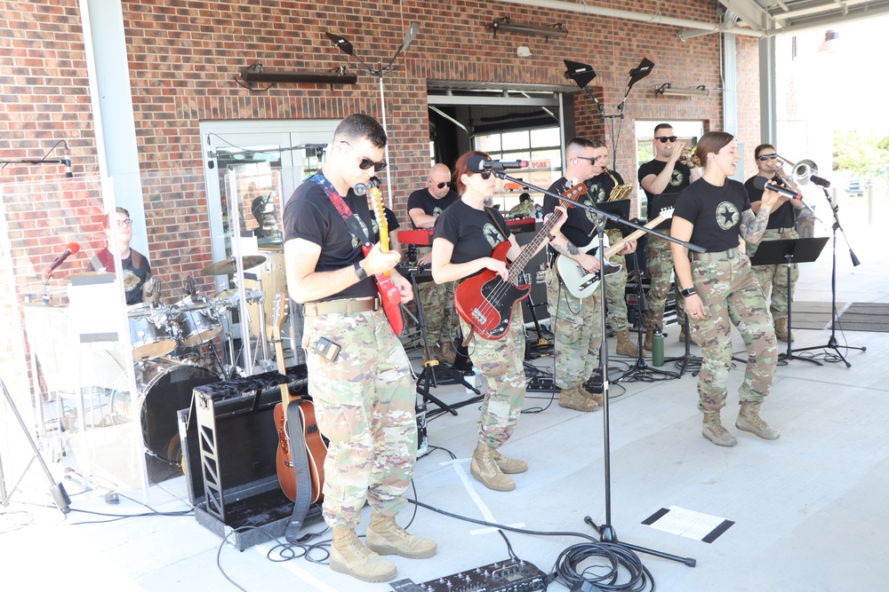 Marching to the beat of a different drum — the 132nd Army Band steps in to cover down on the 77th