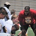 NFL Football star spends time with kids at Fort Lee ProCamp