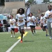 NFL Football star spends time with kids at Fort Lee ProCamp