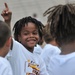 NFL Football star spends time with kids at Fort Lee ProCamp