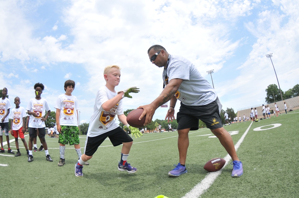 NFL Football star spends time with kids at Fort Lee ProCamp