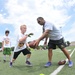 NFL Football star spends time with kids at Fort Lee ProCamp