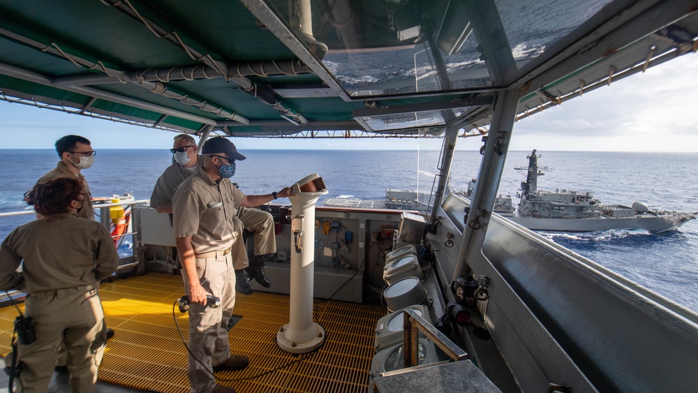 USNS Pecos practices refueling with partnering nations